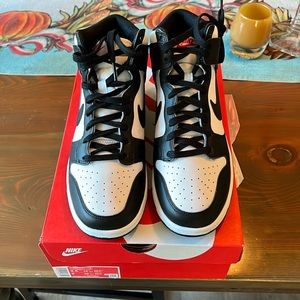 Nike women’s Dunk High Pandas size 9.5. New in box.